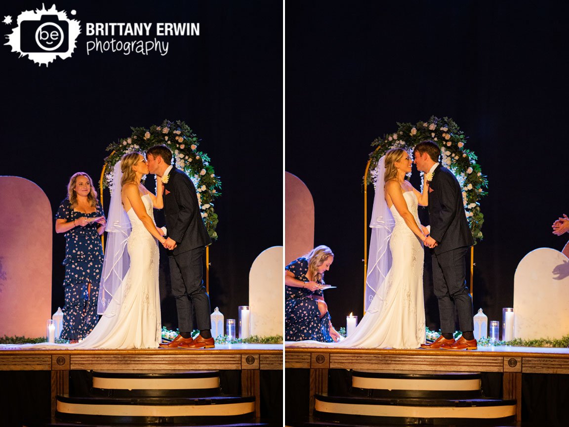 Indianapolis-wedding-photographer-couple-first-kiss-at-indoor-ceremony.jpg
