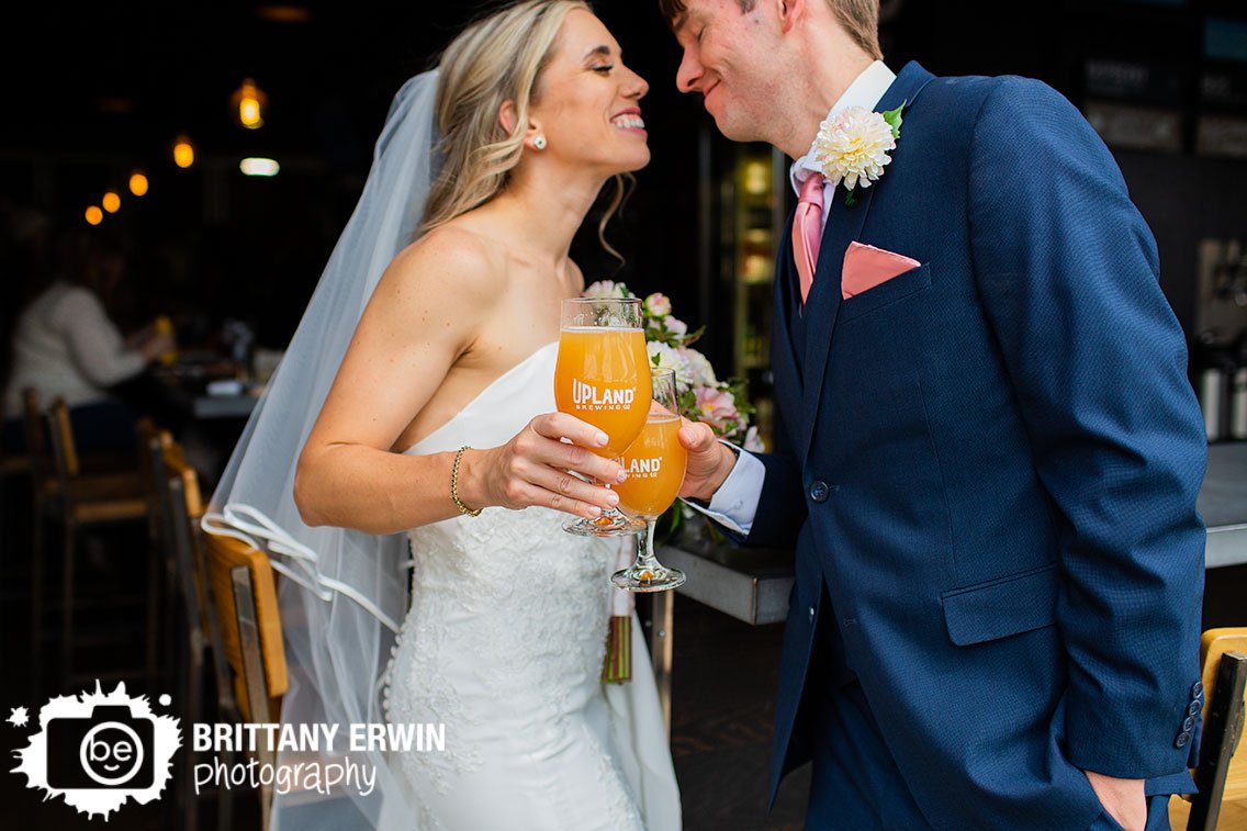 Fountain-Square-Indiana-wedding-photographer-couple-with-beer-glasses-at-Upland-Brewery.jpg