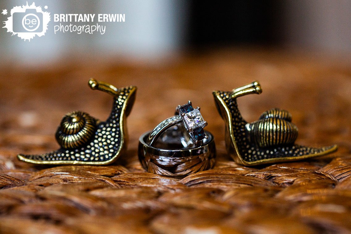 Snail-figures-with-rings-Fountain-Square-Theatre-wedding-photographer.jpg