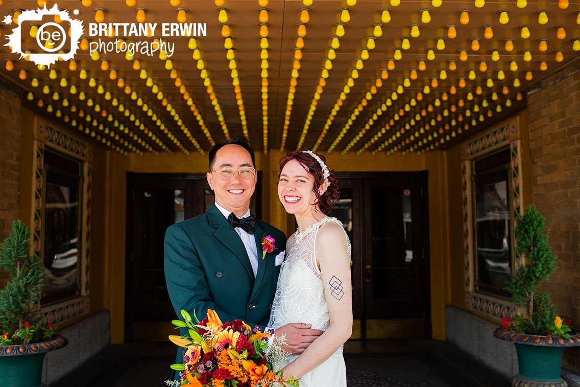 Bridal-portrait-couple-under-lights-of-marquee-at-Fountain-Square-Theatre.jpg