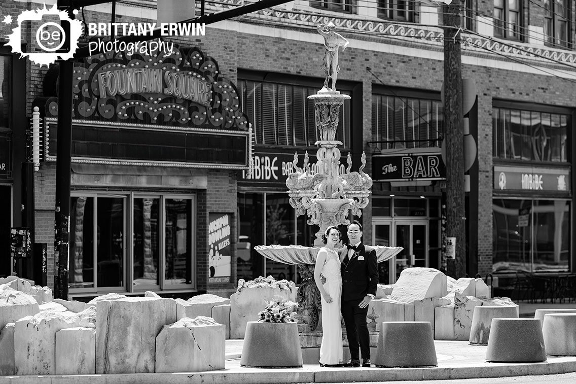 Fountain-Square-Theatre-couple-at-the-fountain-summer-portrait-wedding.jpg