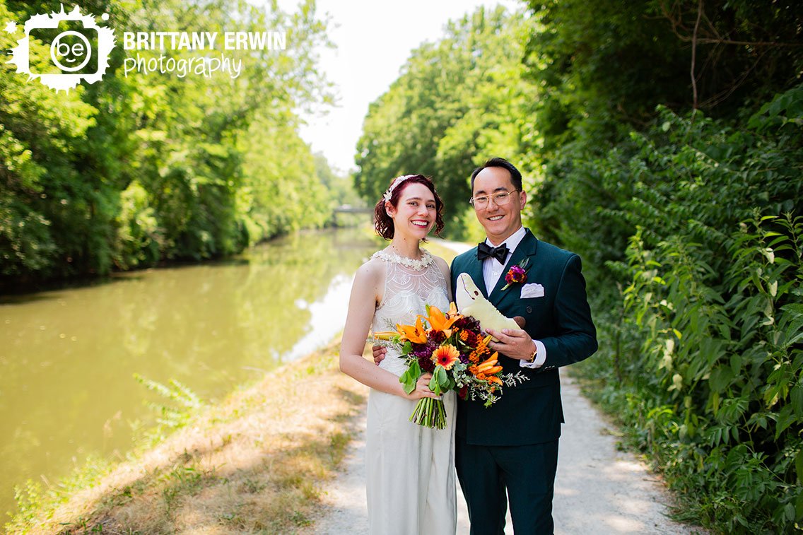 bride-and-groom-next-to-canal-near-Newfields.jpg