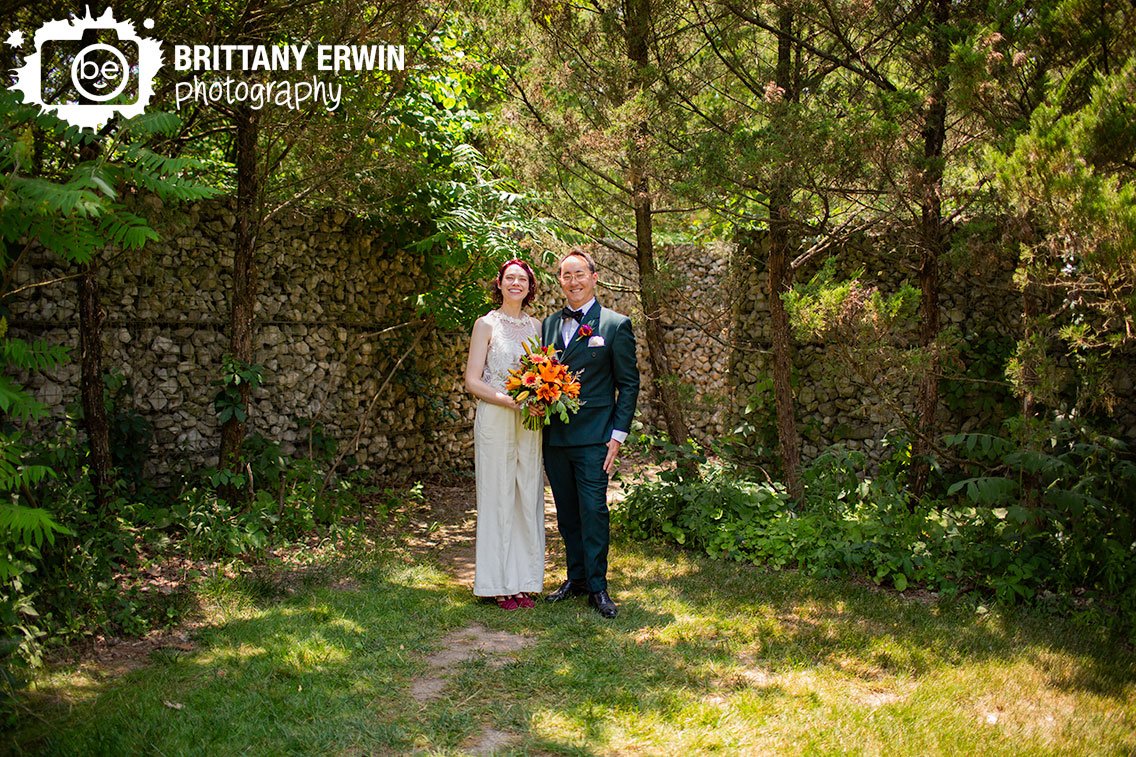 Bridal-portrait-bride-and-groom-with-stone-wall-Indianapolis-wedding-photographer.jpg