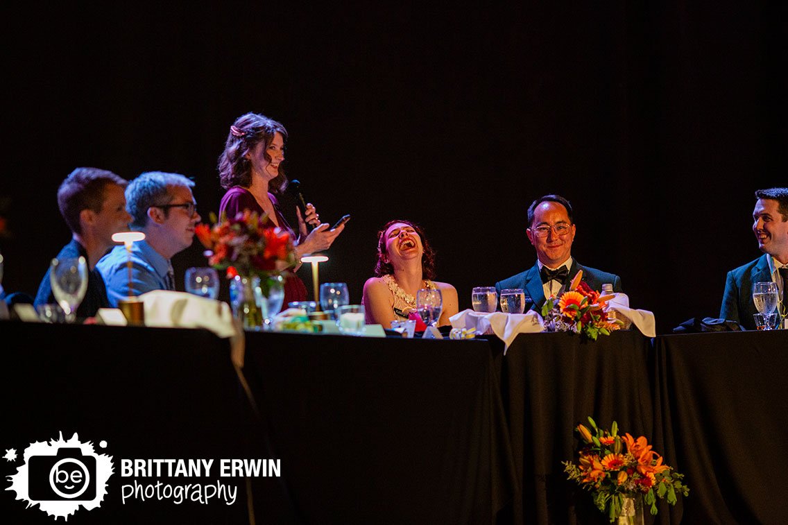 bride-laughing-during-speech-Fountain-Square-Theatre-wedding-photography.jpg