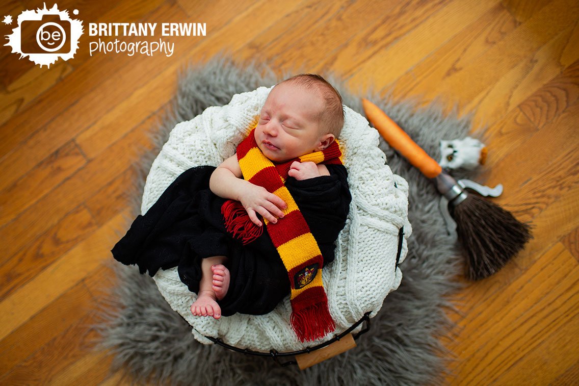 Sleeping-baby-boy-newborn-asleep-in-basket-with-quiddich-broom.jpg