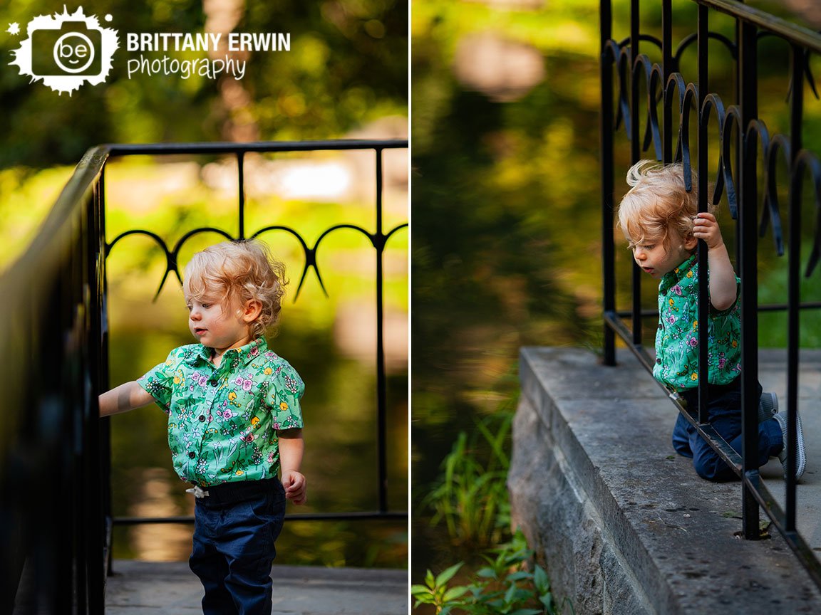 Boy-by-pond-peeking-through-railling-Holcomb-Garden-milestone-session-photographer.jpg