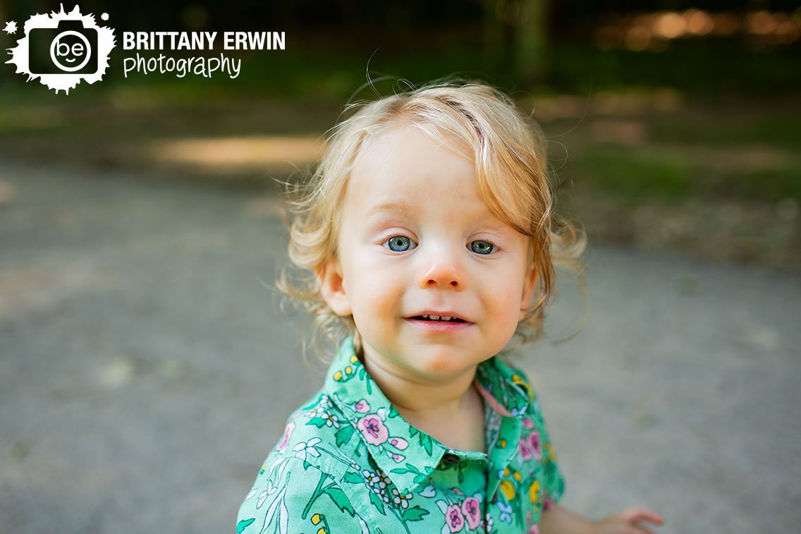 Indianapolis-portrait-photographer-first-birthday-boy-flower-green-nature-shirt.jpg