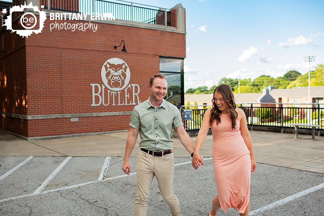 Butler-University-engagement-portrait-session-couple-with-sign-at-sunset.jpg