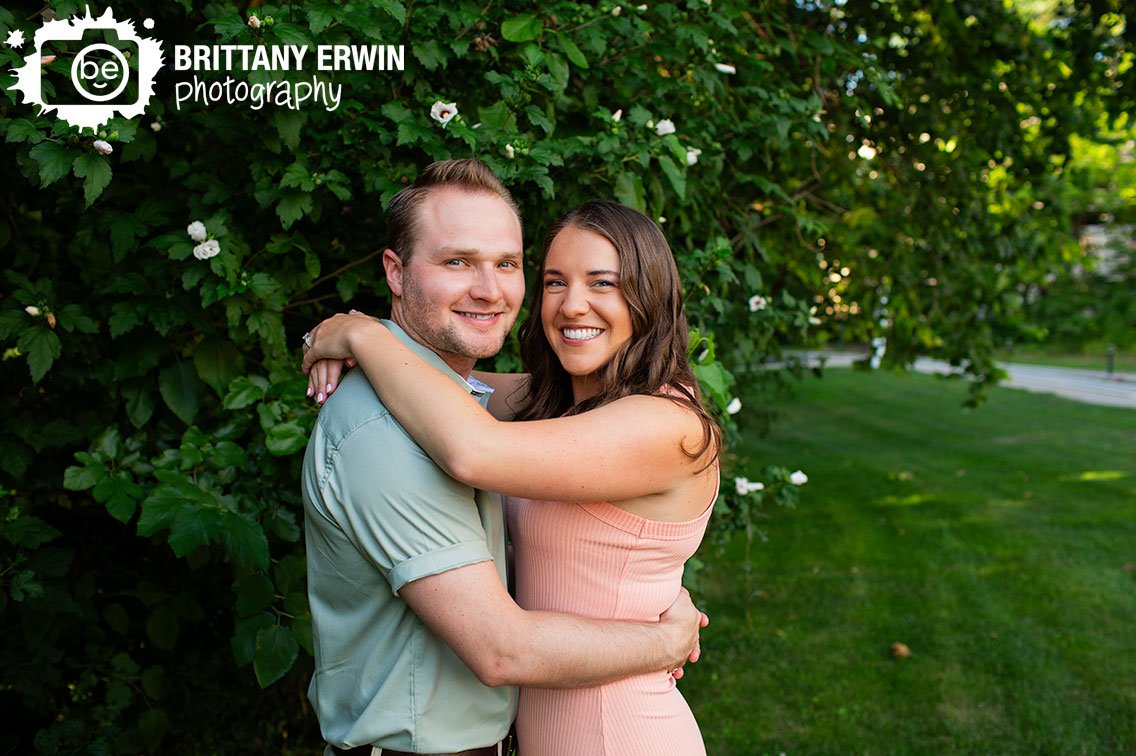 Indianapolis-engagement-portrait-photographer-couple-by-rose-of-sharon-flower-summer-portrait.jpg