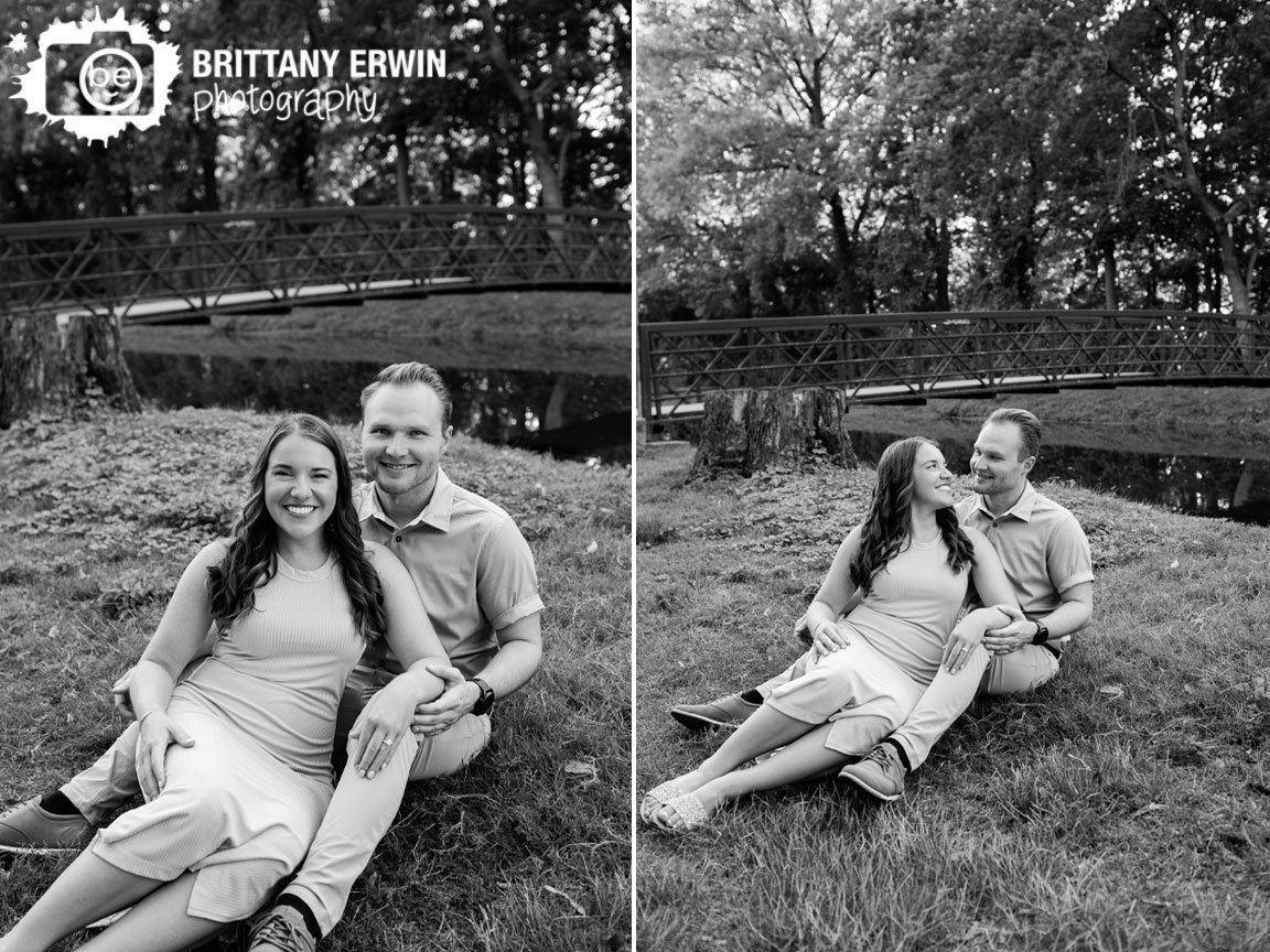 Holcomb-Garden-engagement-portrait-photographer-couple-by-water-with-bridge.jpg