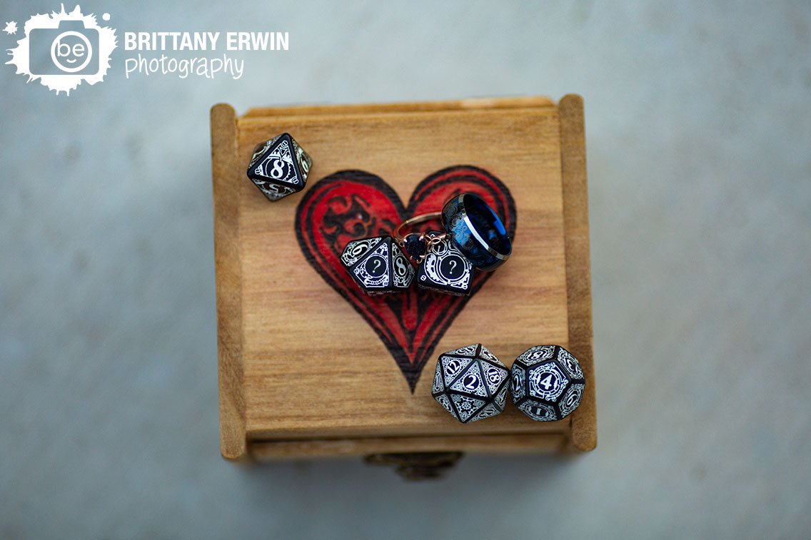 Indianapolis-engagement-photographer-detail-rings-on-dice-showing-wedding-date.jpg