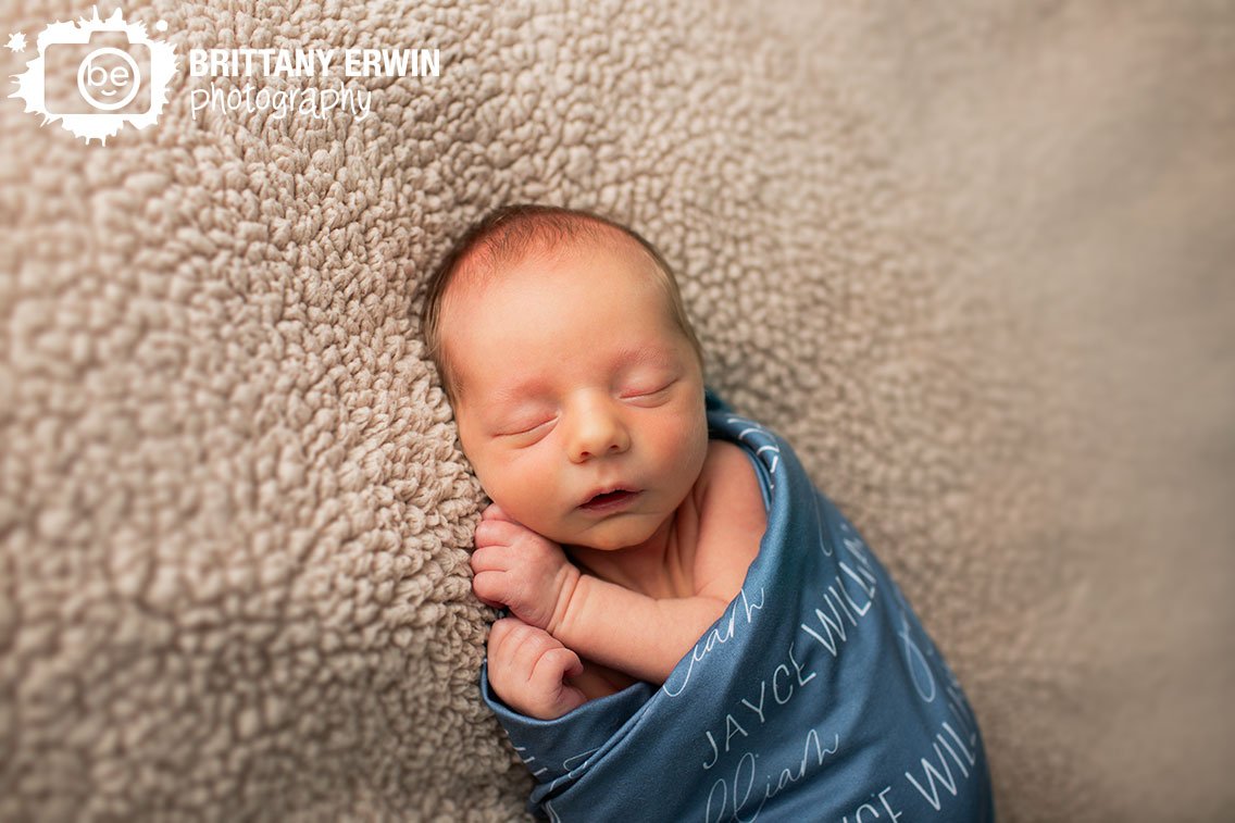 Indianapolis-newborn-portrait-photographer-baby-bow-with-custom-name-swaddle-blanket.jpg
