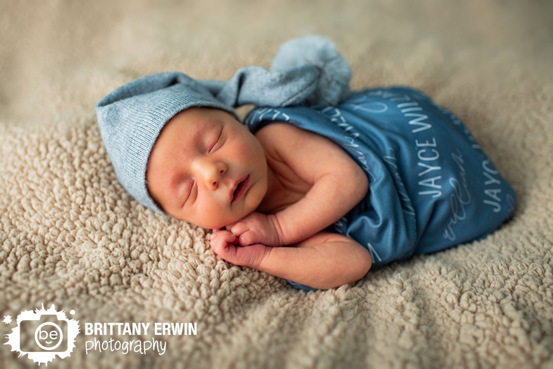 Indianapolis-newborn-portrait-photographer-baby-boy-with-custom-wrap-sleeping-cap.jpg