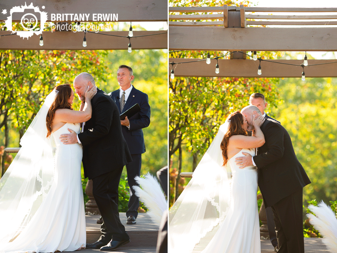 couple-first-kiss-at-ceremony.gif