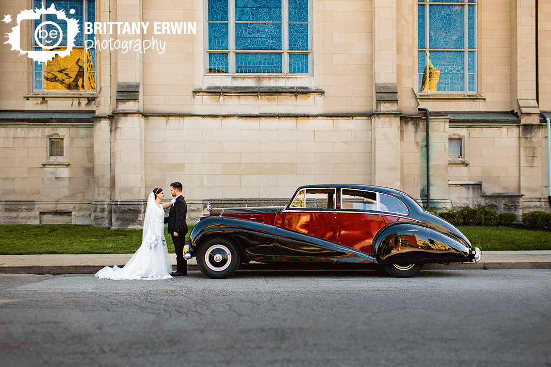 Indianapolis-wedding-photographer-couple-in-front-of-church-with-classic-rolls-royse-car.gif