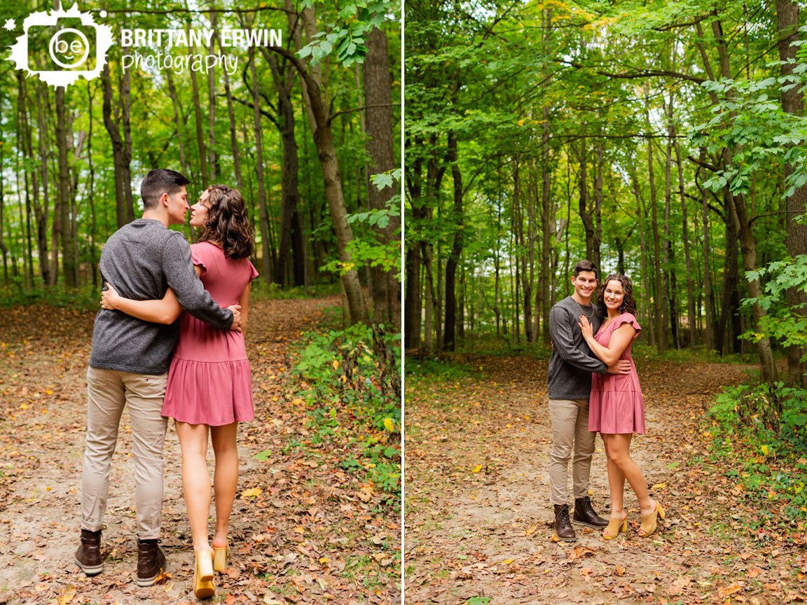 couple-walking-in-woods-engagement-portrait-photographer.jpg