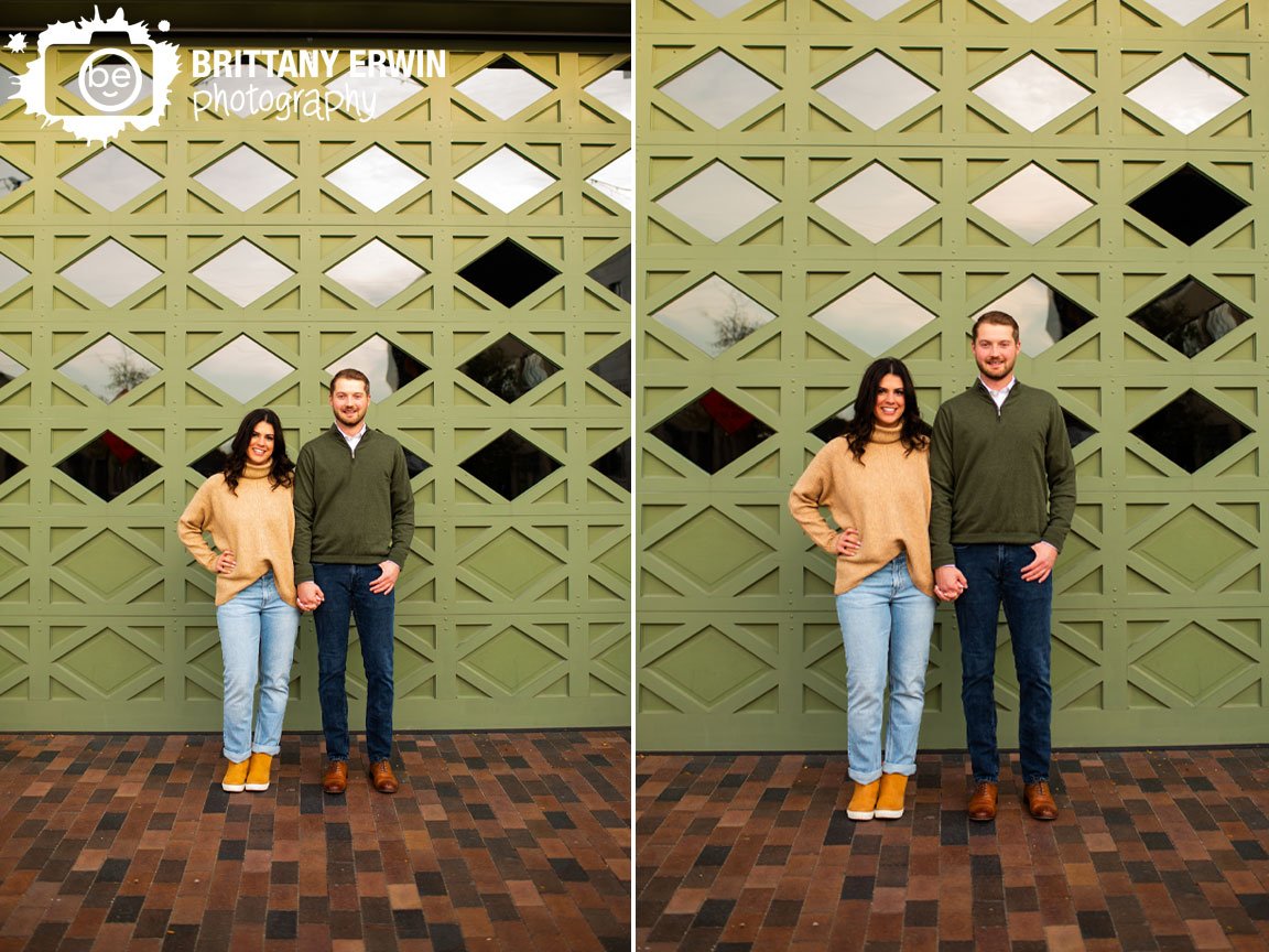 Indianapolis-Mass-Ave-engagment-session-couple-with-decorative-doors-diamond-windows.jpg
