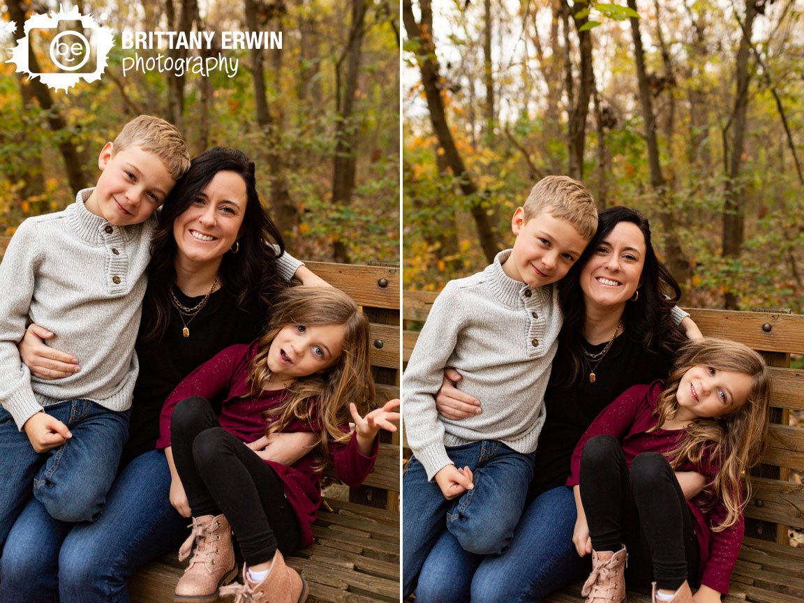 mother-with-son-daughter-silly-on-bench-fall-portrait.jpg