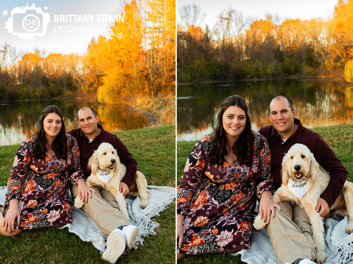 Fall-engagement-portrait-photographer-couple-with-pet-dog-by-pond.jpg