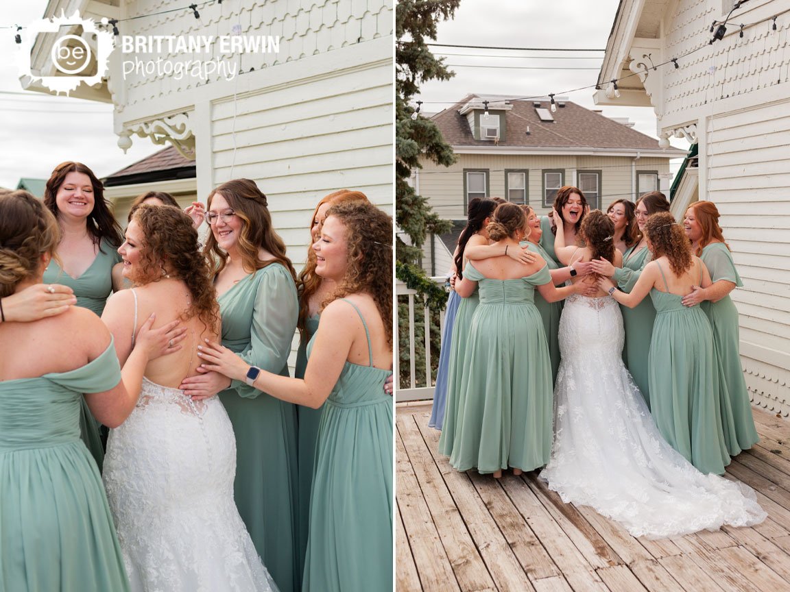 Indiana-wedding-photographer-bride-reveal-to-bridesmaids-on-balcony.jpg