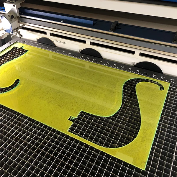 Here we see Tianli Zhang from MFA Photo, Video, and Related Media department laser cutting an Octopus box for Tak's class at VFL.