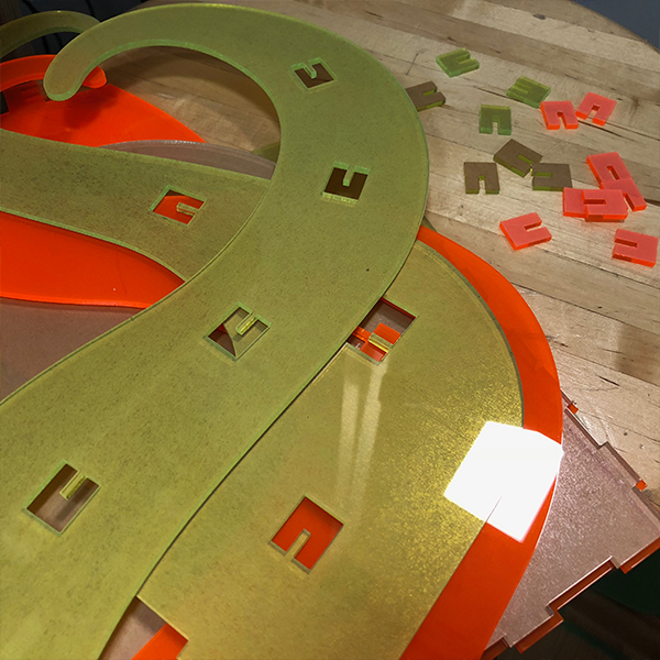 To do this project, he learned how to use the UV Printer as well as the laser cutter.