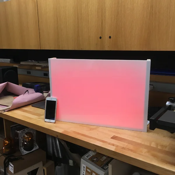 While waiting for her high quality images printed on backlit film to dry, Heather constructed her box with wood and acrylic panels and arranged her lighting elements.