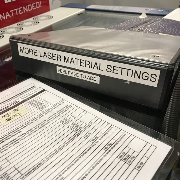 So before you give up on cutting your fabric (yes, you can cut fabric using the laser!) or Bristol paper look through the binder and find something similar. Once you have a similar material you can start doing some test prints.