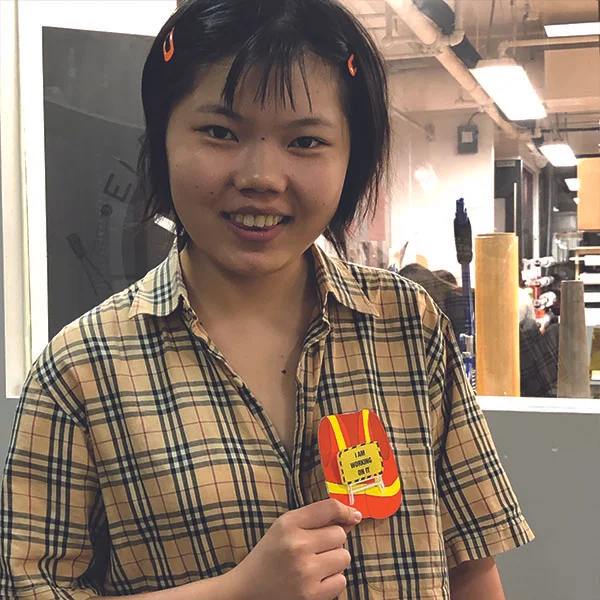 Touching people’s hearts was the assignment that was given to her class and she is creating souvenirs for 'men at work', who dedicate their lives for the service of their city.
