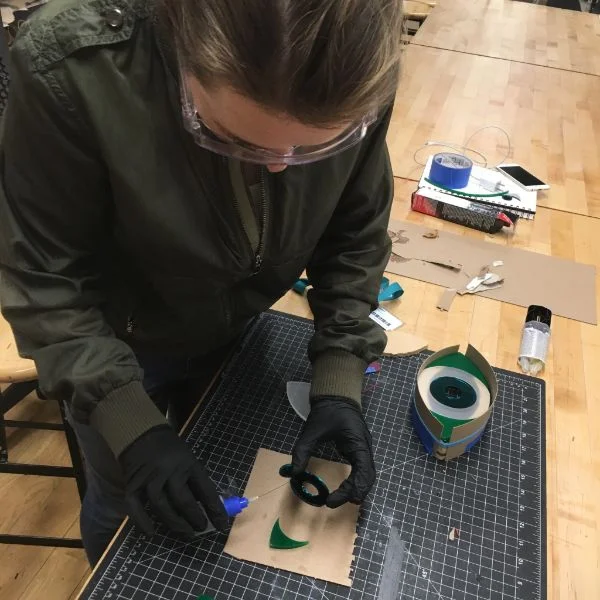 Stephanie Gamble, first year MFA Products of Design student working on the housing for an internet of things device. This device has a motion sensor which can detect that your friend got home safe and send a text to help you rest easy.