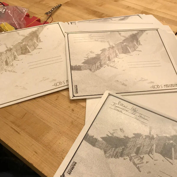 After a few tries we considered stickers until returning to the UV printer. Now that the machine has been chosen and the process settled, Petros can bring his final envelopes in and get them ready to send out!