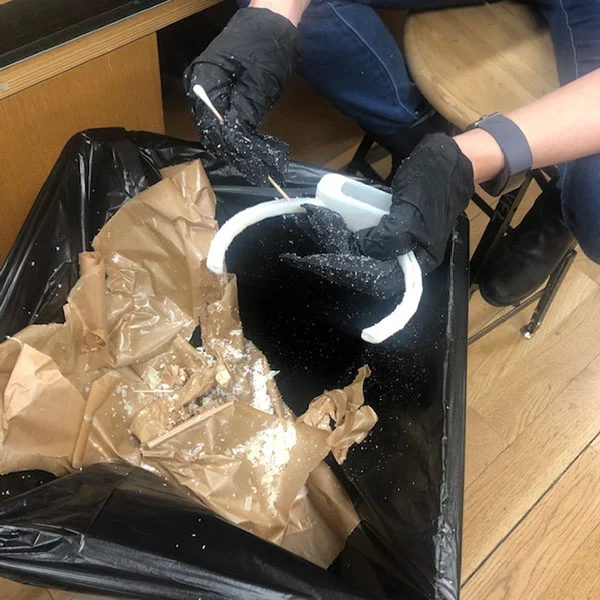 Catherine Stoddard, a 1st year MFA Products of Design student, is painstakingly removing support material from a 3D print she ran last night on our Objet Connex260 printer. She is creating a model of her product: Color Talk, that will be featured in a film for Video Storytelling.