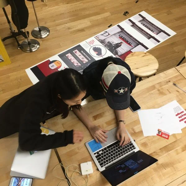 Phuong Anh and Seona are in the lab printing banners for the upcoming Products of Design gallery show.
