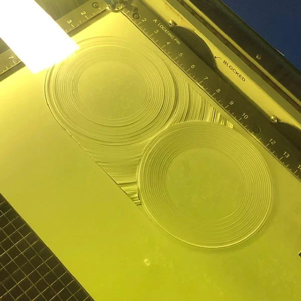 She's currently laser cutting a mat as part of a tea set that is meant to teach users to be patient and comfortable with boredom through the process of tea-making.