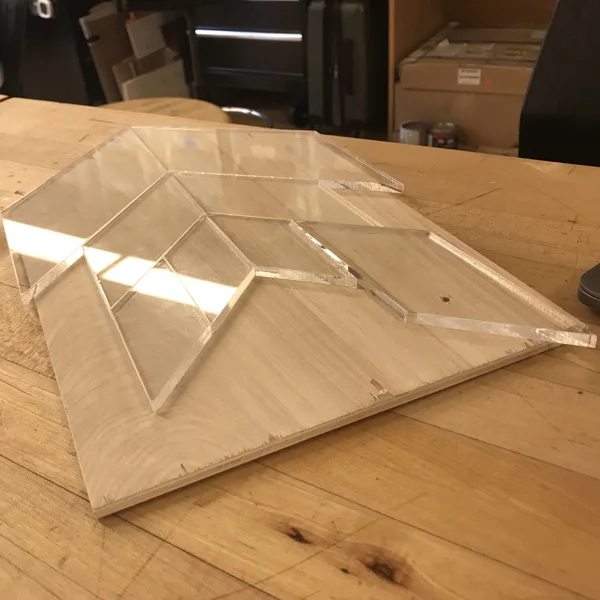 Hannah’s been using the laser cutter and wood shop to produce this puzzle system where families or even offices can write their values on the pieces and interchange the parallelograms.
