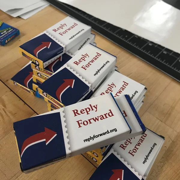 By using the Vinyl printer, Hannah made stickers to personalize boxes of crayons that her participants will use to write and decorate postcards to be sent to the mayor.