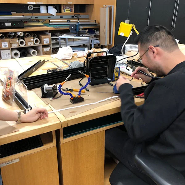 Phuong Anh Nguyen of SVA's MFA Products of Design is on the final day of fabrication before deploying her pop-up experience as part of her thesis work. She is staging the experience to ask the question, "What would it be like to take a moment and reflect on life with a stranger?"