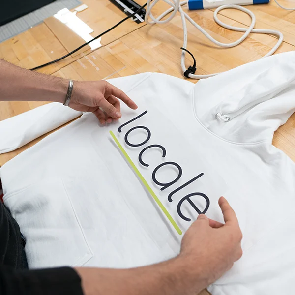 Andre Orta from MFA Product of Design uses the heat transfer tonight to make his hoodie project.