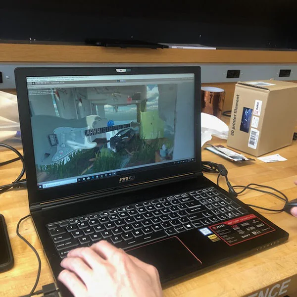 Making use of VR technology, they are recreating the gallery space within the virtual space as pictured in the laptop screen. The 3D printed hands placed in the environment will also influence the virtual environment, and vice versa.