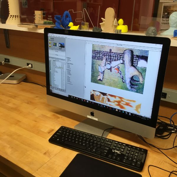 She is using the vinyl plotter to print posters as well as some stickers to promote the illustration work she's done for her thesis project.