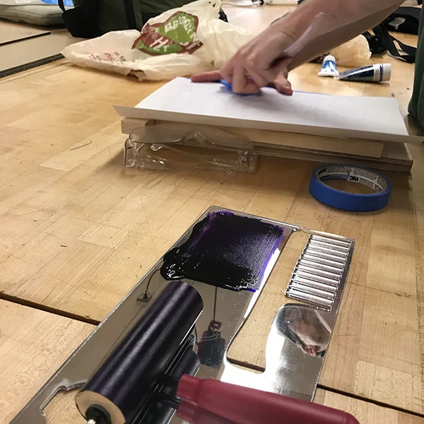Owen from MFA Fine Arts was using the maker space today to do some relief prints on top of some Risolab prints.