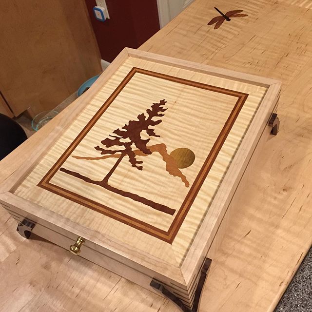 Two images...Completed yesterday....curly maple, walnut. Marquetry design all natural veneers.