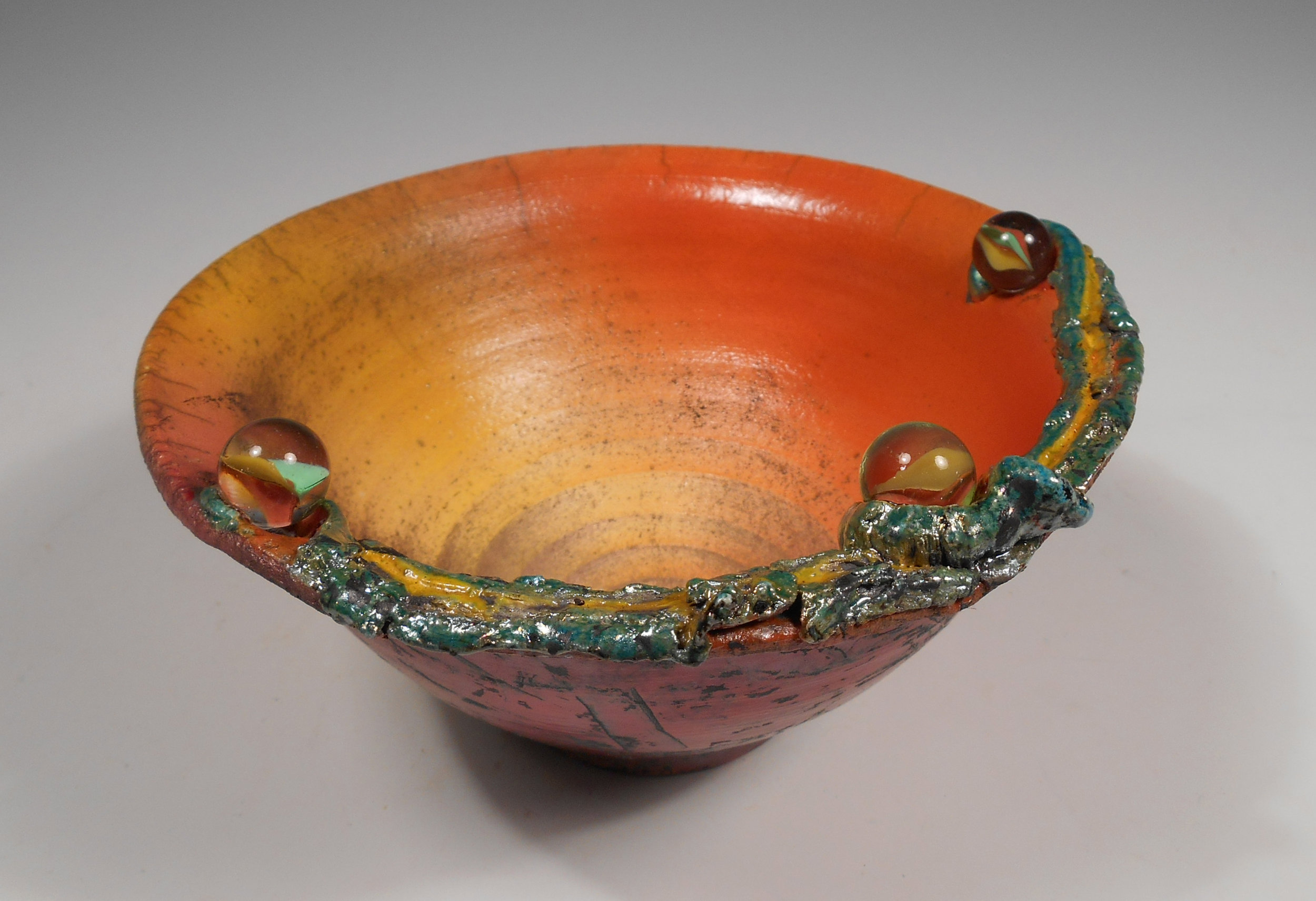 Corinne Cox raku bowl w marbles.jpg