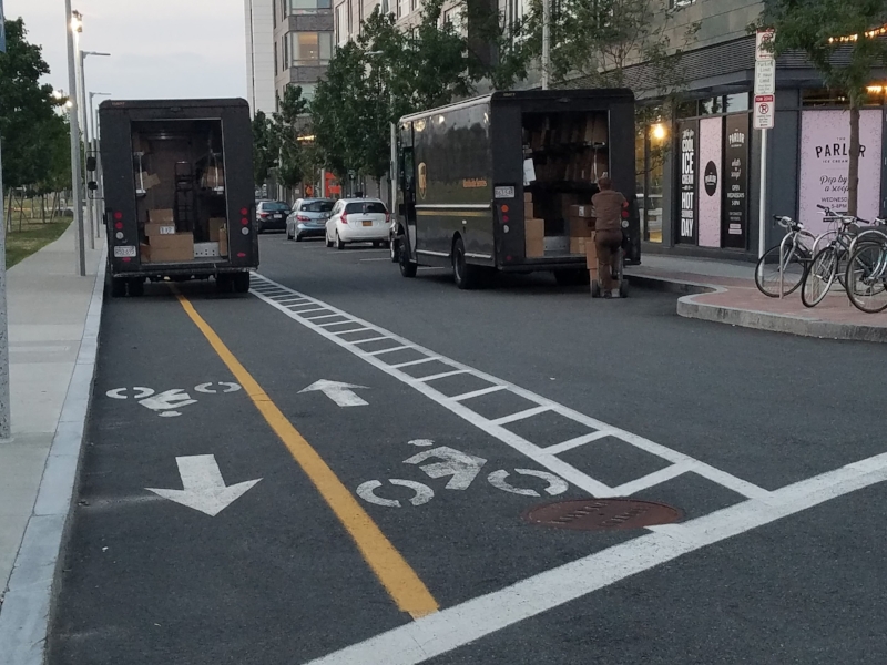 Spurr Street, Allston, MA. UPS driver blocks bike lane with truck.