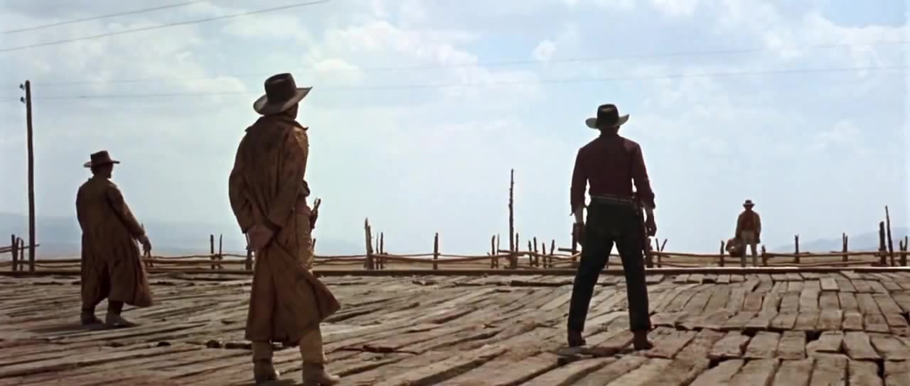 Gunslingers stand off against their target in Leone's Once Upon a Time In the West.