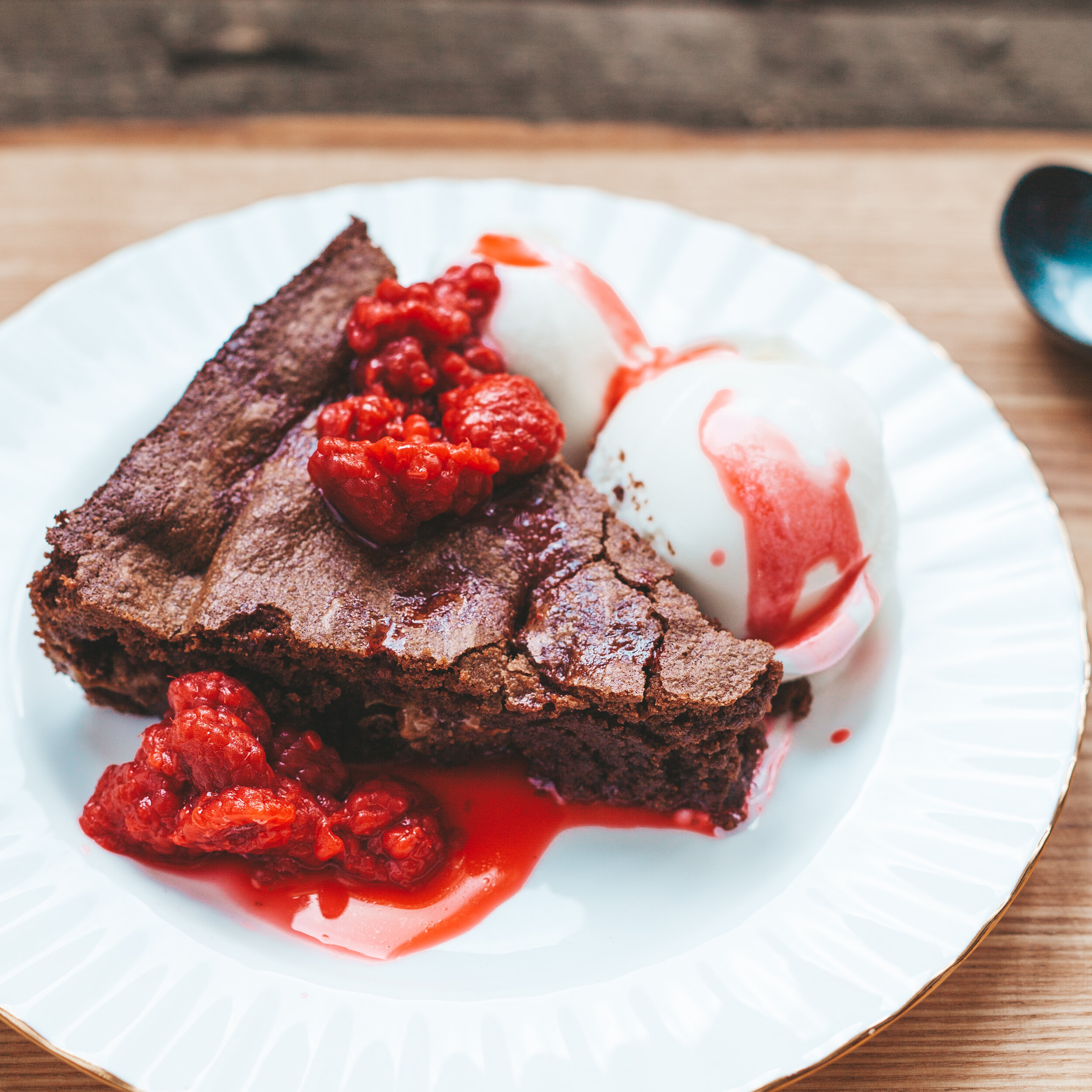 Fudge Brownies with home canned Raspberries