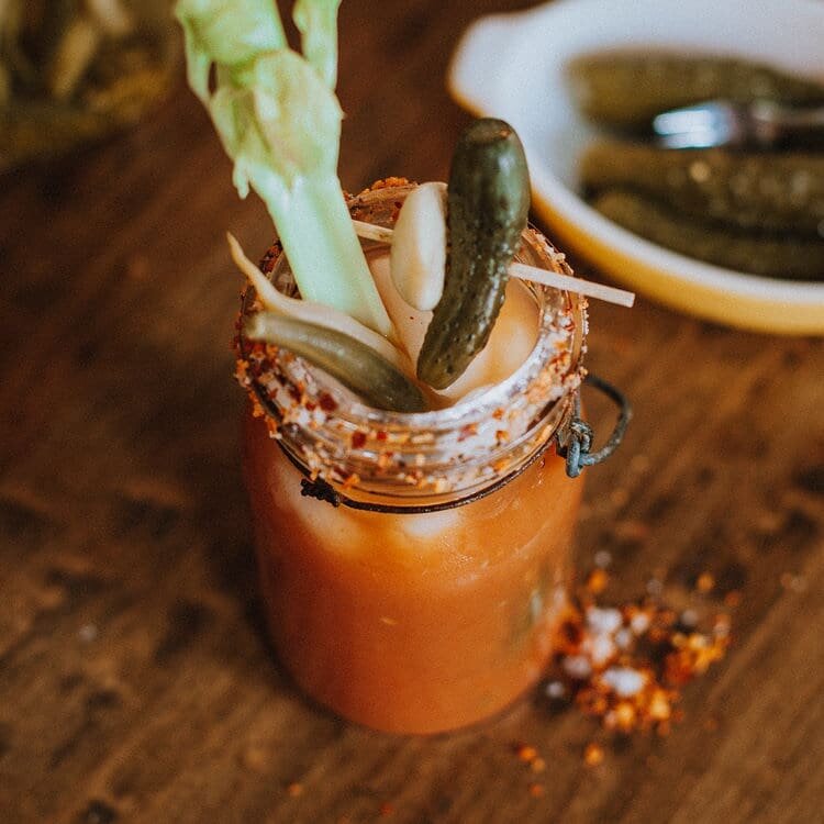 I'm joining @pbbergen for National Caesar day.  This Caesar is made with home canned tomato horseradish juice, home canned garlic and beans. #canningculture #ballcanning #bernardin #tomatoandhorseradish #caesar #nationalcaesaerday