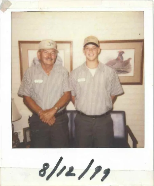 Trey with his maternal grandfather, Dick Parker. Mr. Parker also worked in the family business raising pullets.