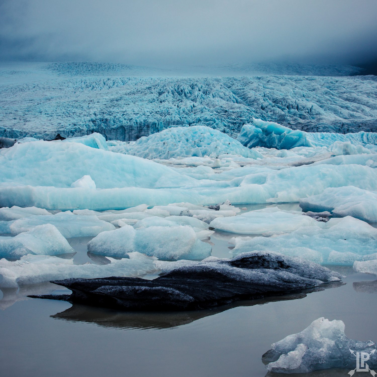 Looking up towards the glacier using a zoom lens. My goal was to contrast the black volcanic ice in the middle from the blue ice behind it. Canon 5D Mark IV, 70-200mm | f/9, 1/100 sec, ISO 100
