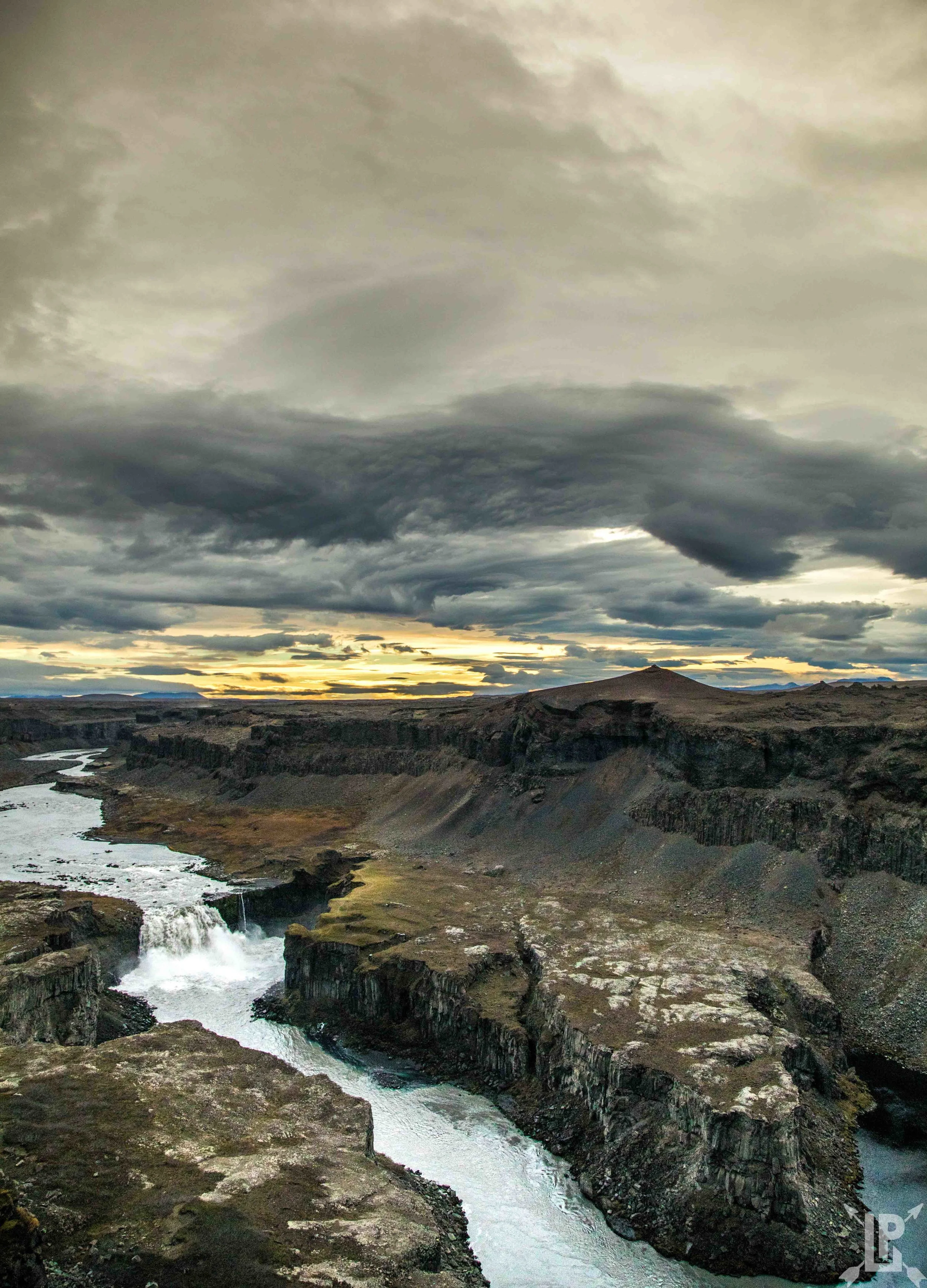 Canon 5D Mark IV , 24mm | f/5, 1/1600 sec, ISO 800 This photo is taken down the river from Dettifoss. This waterfall is the neglected waterfall due to Detifoss being just around the bend. This was a tough one to photograph. The wind on top of this peak was cranking and there was a little bit of light so I had to have a high shutter speed, high ISO and a low aperture. It's a little more grainy than what I'd like and I would have preferred an f/8 or higher but it turned out great nonetheless. 